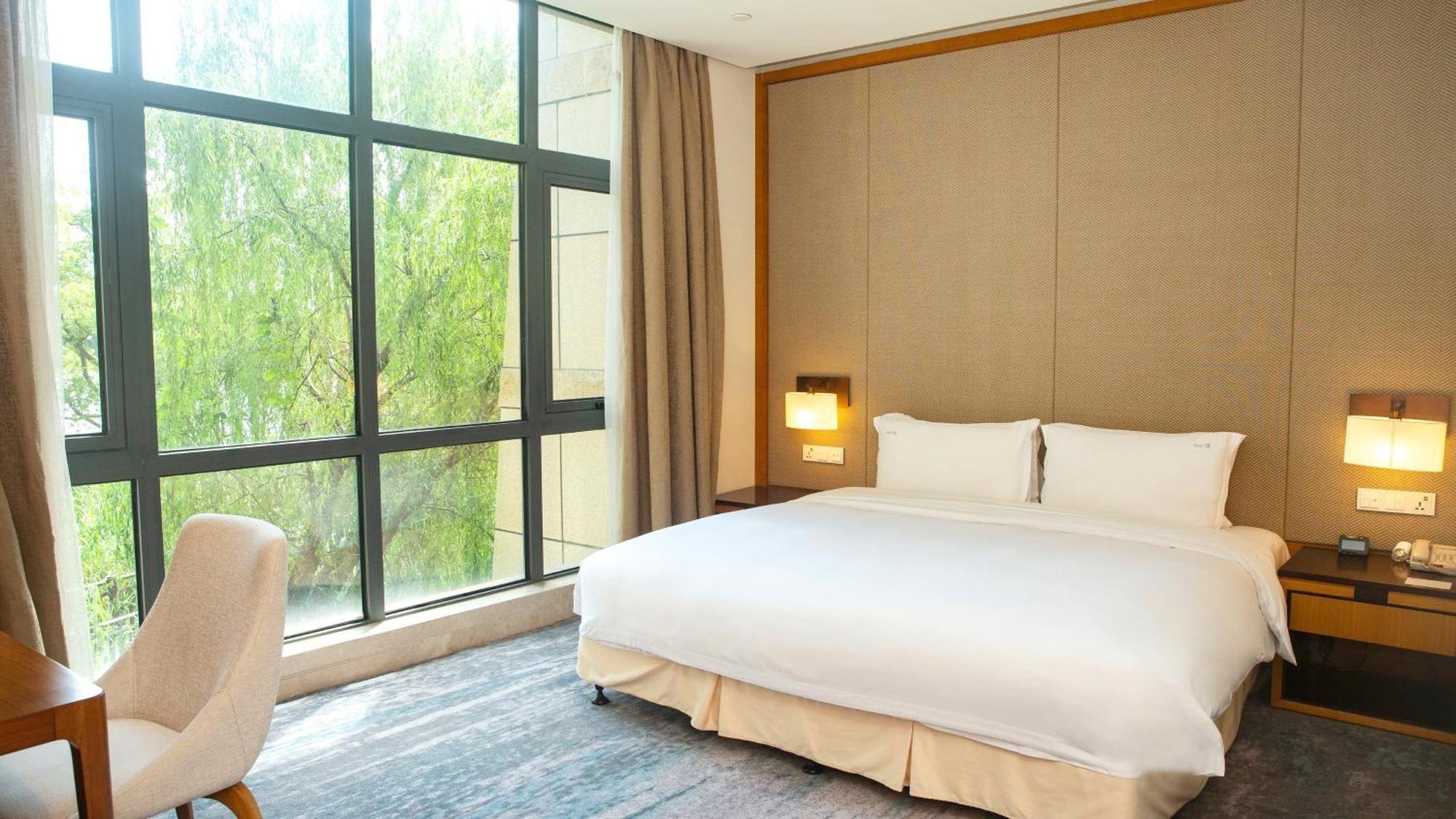 Holiday Inn Kunshan Huaqiao By Ihg Exterior photo
